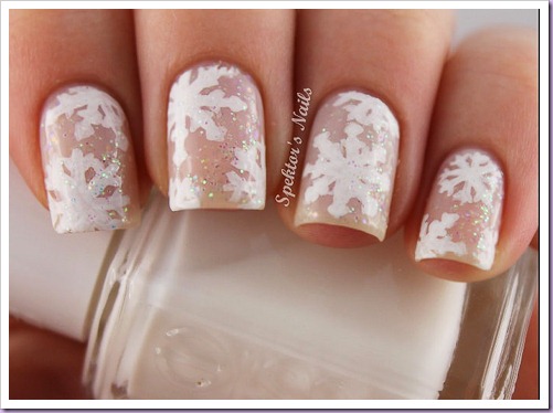 http://www.spektorsnails.com/2012/12/glitter-snowflake-nails.html